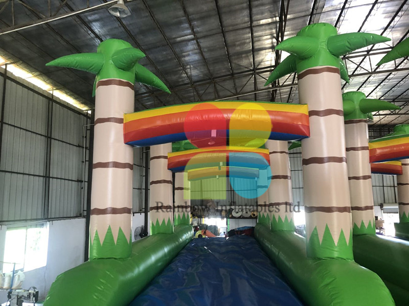 green inflatable double lines coconut tree slide with small pool